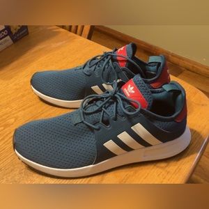 Brand new without box never worn size 9. Adidas Racer style tennis shoes.